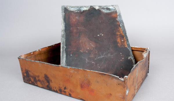 An old and weathered metal box