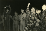 Enthusiastic students attend a pep rally in their pajamas during the 1938 football season.  This pep rally came 19 years after foorball was reinstated.